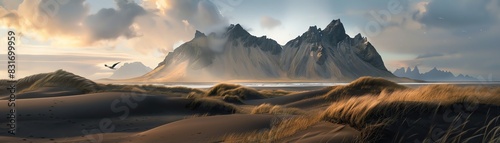 Scenic panorama of rugged mountain range with dramatic skies, surrounded by rolling sand dunes and soft lighting. photo