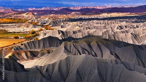 Aerial Forward Scenic Shot Of Natural Pattern Of Sand Mountains At Famous State Park - Moab, Utah photo
