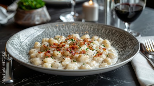 Creamy, Delicious Gnocchi With Crispy Bacon Bits And A Sprinkle Of Chives.