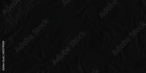 Black paper texture is crumpled paper texture. Black crumpled and creased paper texture. Black crumpled blank paper texture. Grunge paper texture.