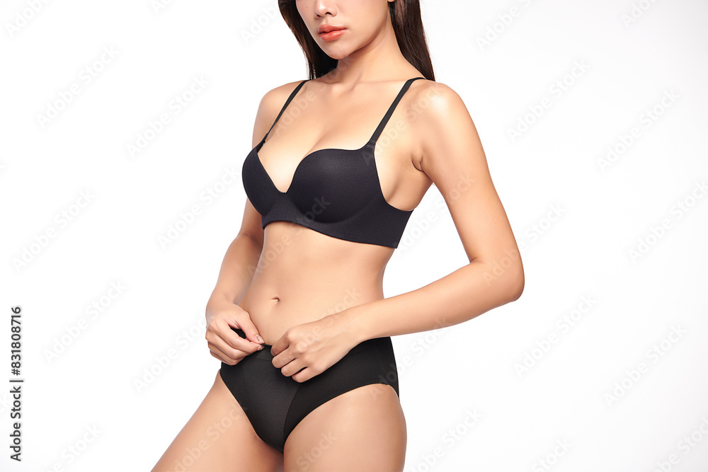 Obraz premium Confident beautiful young asian woman posing in black lingerie on white background, Perfect body,