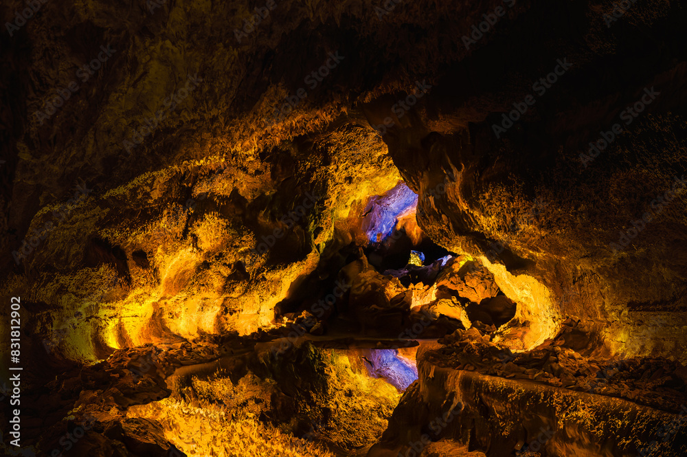 Discover the underground marvel of Cueva de los Verdes in Lanzarote, a stunning reflection in the volcanic tunnel waters, perfect for captivating imagery.