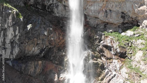 Caucasus, North Ossetia. Digoria gorge. Waterfall on the rocks.