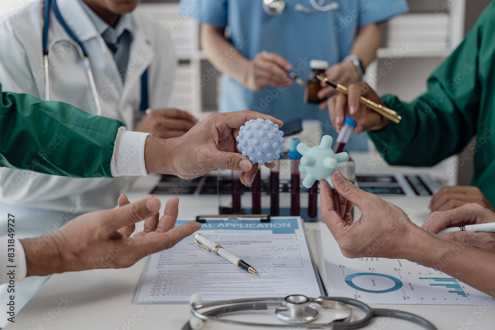 Medical team meeting discusses case of patient being treated for brain cancer at hospital lab. health concept Close-up pictures Medical team meeting discusses case of patient being treated for brain cancer at hospital lab. health concept Close-up pictures
