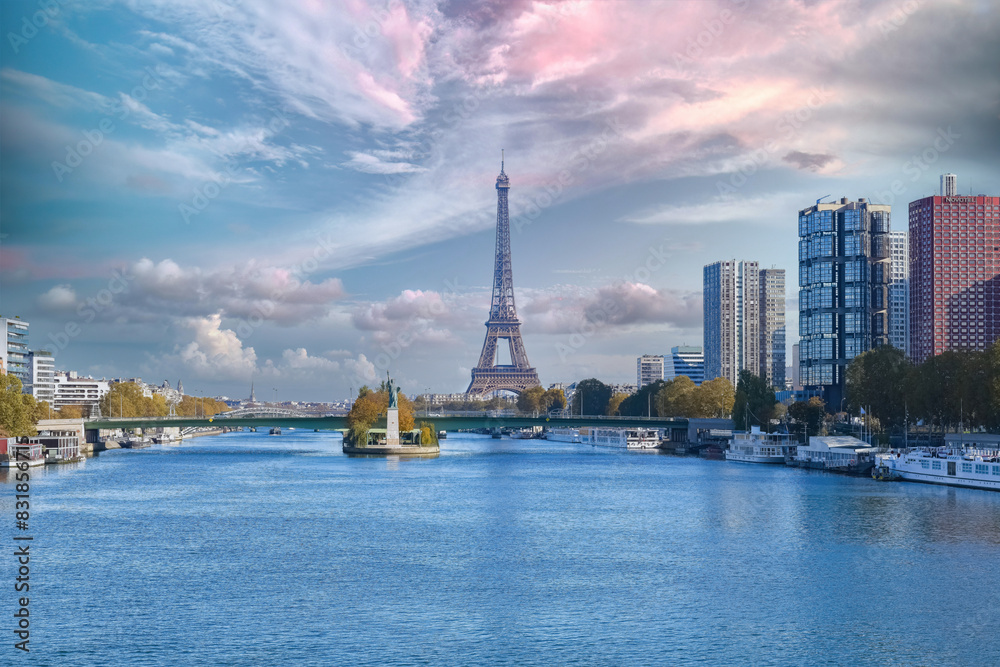 Fototapeta premium Paris, the Grenelle bridge on the Seine, with the liberty statue, and the Eiffel Tower in background 