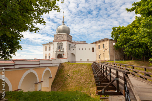 An old castle in the Belarusian city of Grodno against a background of blue sky in light clouds