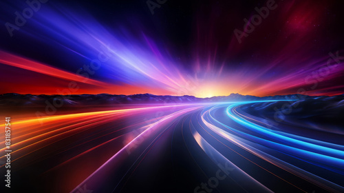 Vibrant abstract light trails creating a dynamic and colorful futuristic landscape. Perfect for tech, speed, or energy themes.