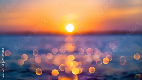 Capture the beauty of nature's light show with an image showcasing a bokeh abstract blurred background, adorned with shimmering lighting bokeh on the sea at sunset. © Wattana