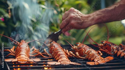 someone Grilled shrimp on stove. seafood of Thailand. photo