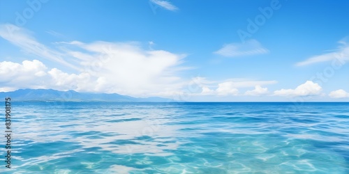 Photo of serene seascape with clear blue ocean sky and calm water. Concept Seascape Photography, Clear Blue Sky, Calm Water, Tranquil Ocean View