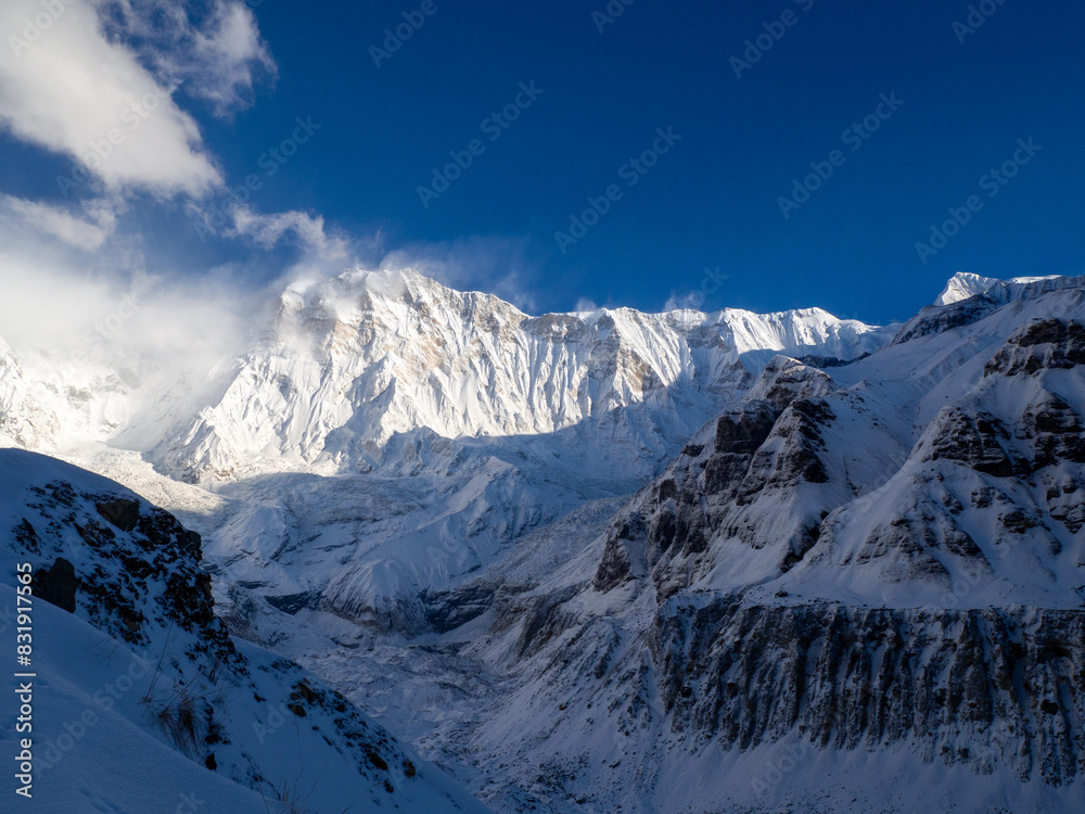 Obraz premium Shot of snow-covered towering mountains reaching high into the sky