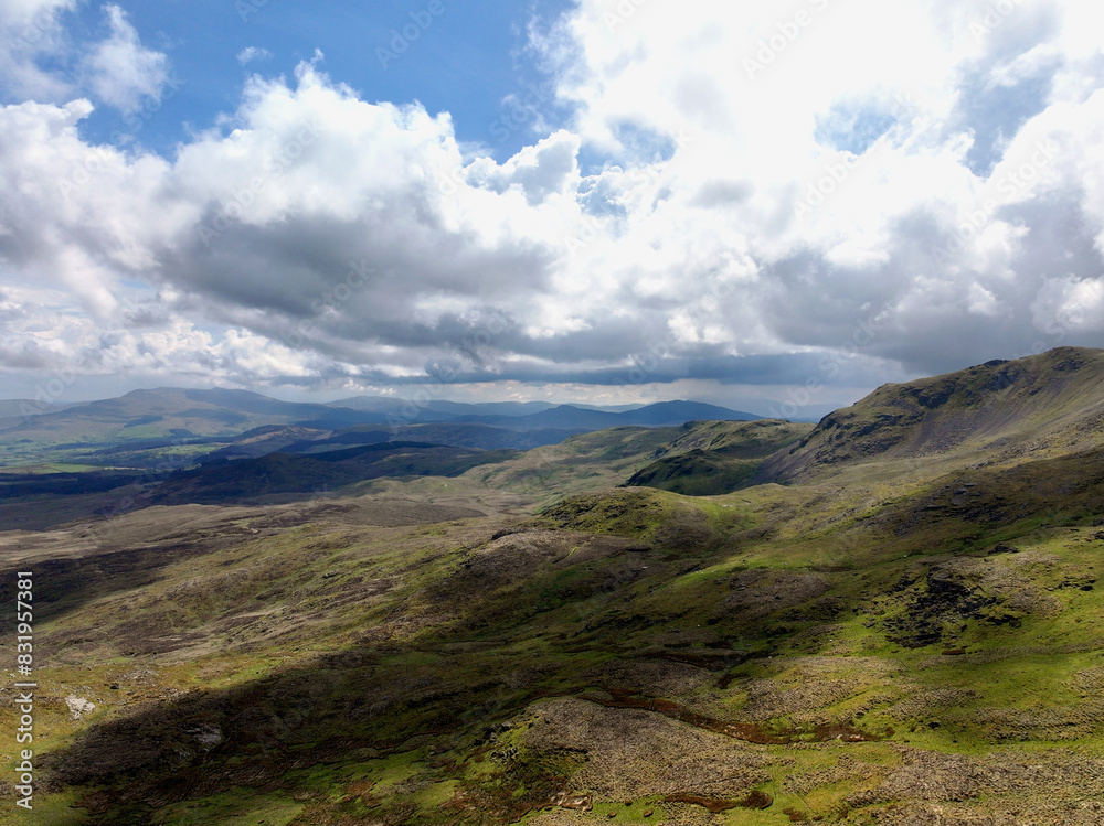 Fototapeta premium Beautiful landscape of rolling hills and valleys in Arenig Fawr, North Wales, Snowdonia