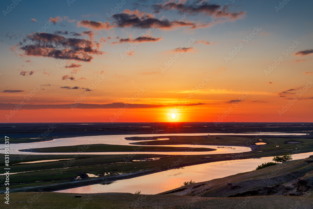 Fototapeta premium Sunset in Liujiazi, Dulbert Mongolian Autonomous County, Daqing City, Heilongjiang Province, China.