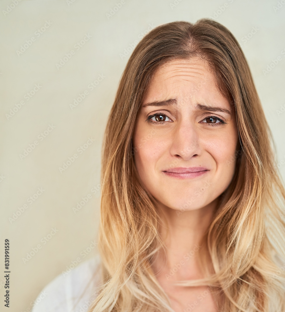 Face, woman and unhappy on portrait in studio background with unsure, uncertain and sad. Female person, isolated and facial expression or feeling for confused, disappointed and regret or emotional Face, woman and unhappy on portrait in studio background with unsure, uncertain and sad. Female person, isolated and facial expression or feeling for confused, disappointed and regret or emotional