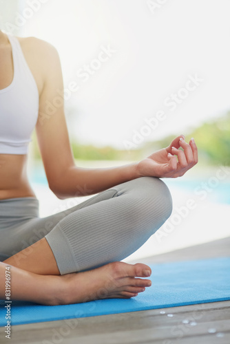 Lotus hands, meditation and girl on a patio for peace, wellness and mental health balance outdoor. Relax, zen and woman on yoga mat for mindfulness, gratitude and holistic, breathing or stress relief