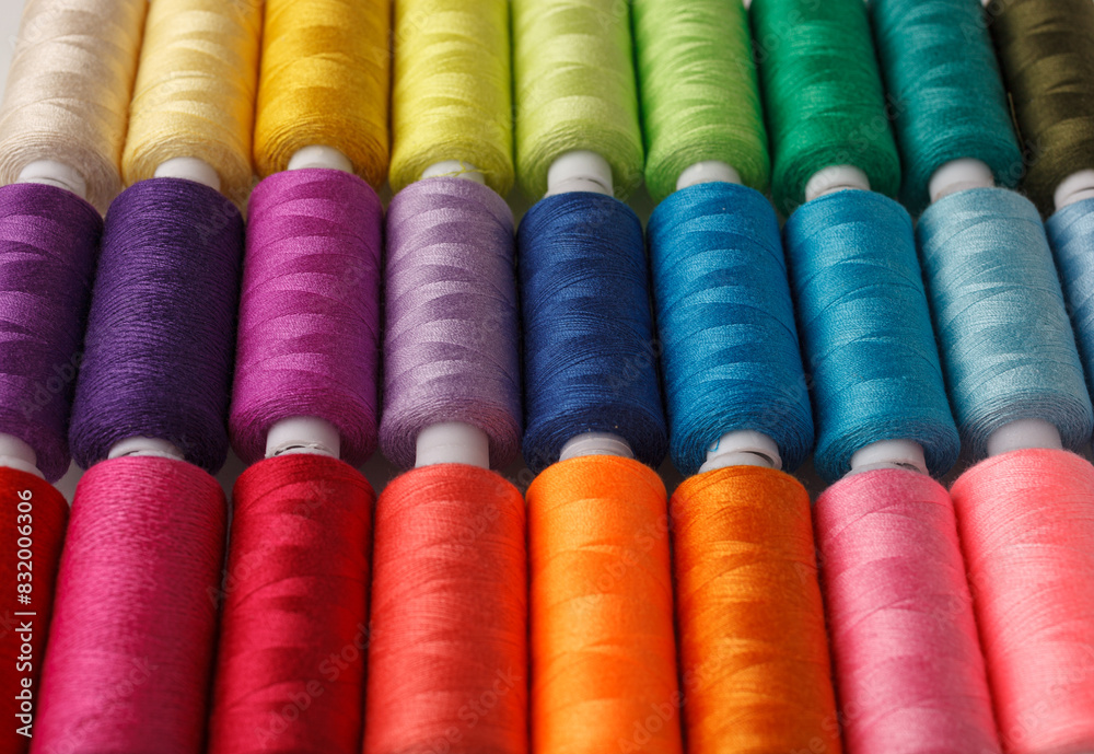 Set of colorful spools of thread Set of colorful spools of thread
