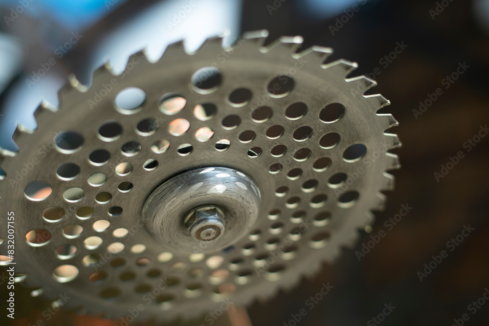 Grass cutting disc. Garden tools for mowing lawn. Sharp steel disc. Grass cutting disc. Garden tools for mowing lawn. Sharp steel disc.