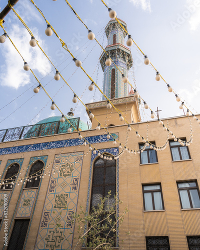 Beautiful Al Ghadir Mosque in Qom, Iran with blue and gold tile work photo