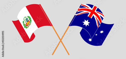 Crossed and waving flags of Peru and Australia