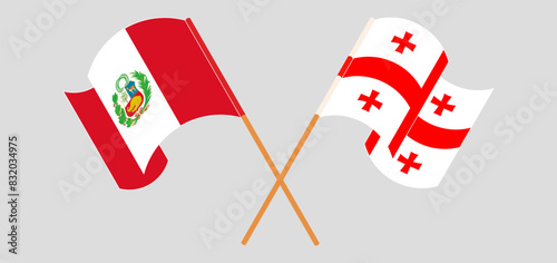 Crossed and waving flags of Peru and Georgia