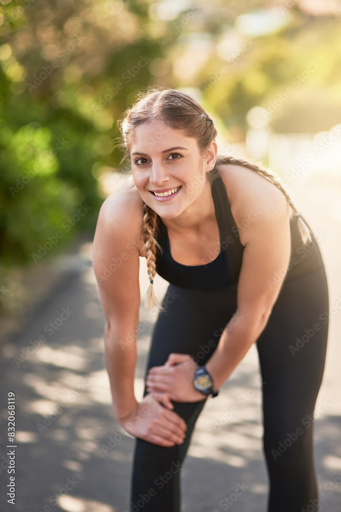 Portrait, tired runner and happy woman relax outdoor after exercise, workout or training healthy body in summer. Fitness, smile and athlete on break to rest for sports, wellness or fatigue in Germany Portrait, tired runner and happy woman relax outdoor after exercise, workout or training healthy body in summer. Fitness, smile and athlete on break to rest for sports, wellness or fatigue in Germany