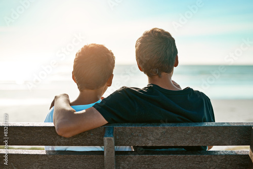 Photography Love, kids and brothers hug on beach bench at sunset with care, trust and bonding on vacation together