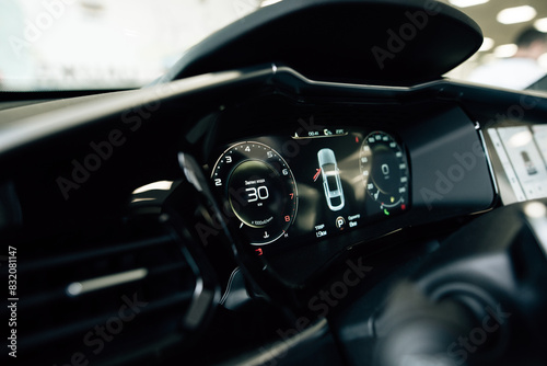 Close up shot of a speedometer in a car. Car dashboard with details