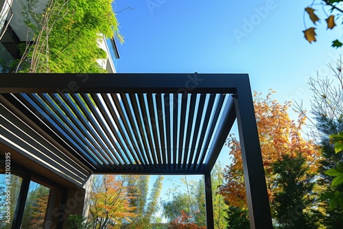 Slatted or Louvered Roof with Adjustable Light Control

 photo