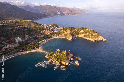 Aerial view of the Sicilian rocky shoreline of Taormina municipality with Isola Bella in the foreground, Taormina, Ionian sea, Mediterranean sea, Messina province, Sicily, Italy, Mediterranean photo