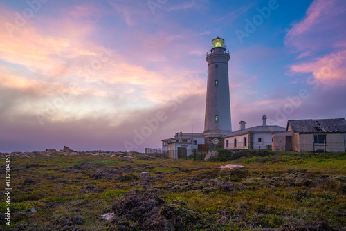 View of Seal Point Lighthouse at sunset, Cape St. Francis, Eastern Cape Province, South Africa photo