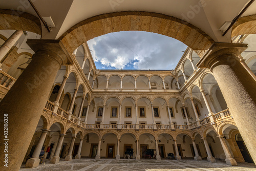 PALERMO, ITALY, 15, JUNE, 2023 - The internal courtyard or cloister of the Norman Palace in Palermo, Sicily, Ita photo