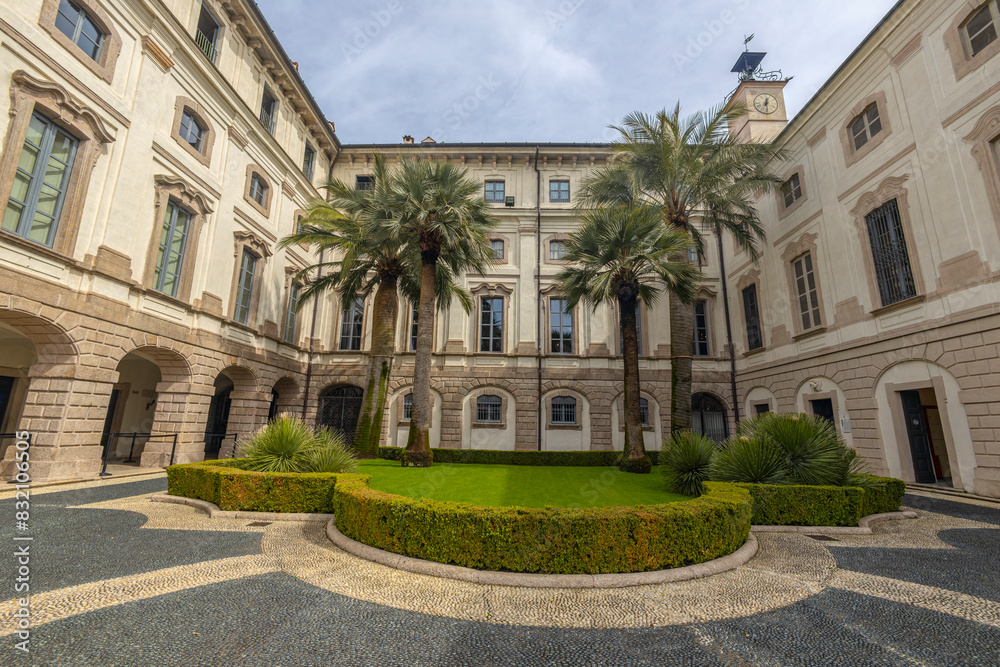 Obraz premium STRESA, ITALY, APRIL 4, 2024 - The facade of Borromeo Palace in Isola Bella, Stresa, province of Verbano-Cusio-Ossola, Piedmont, Italy.