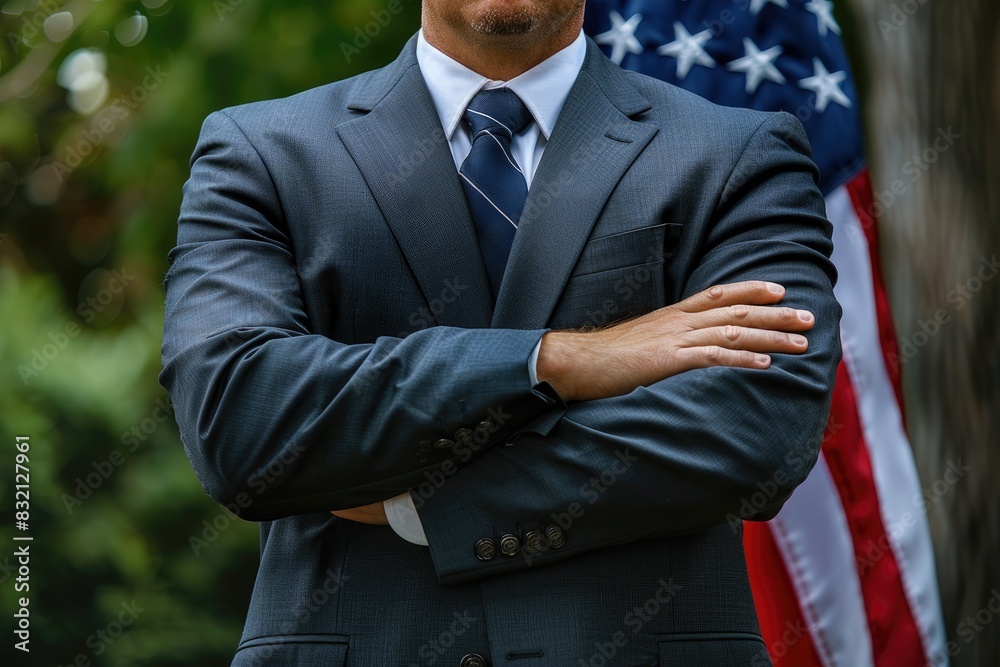 Businessman with Arms Crossed and USA Flag Businessman with Arms Crossed and USA Flag