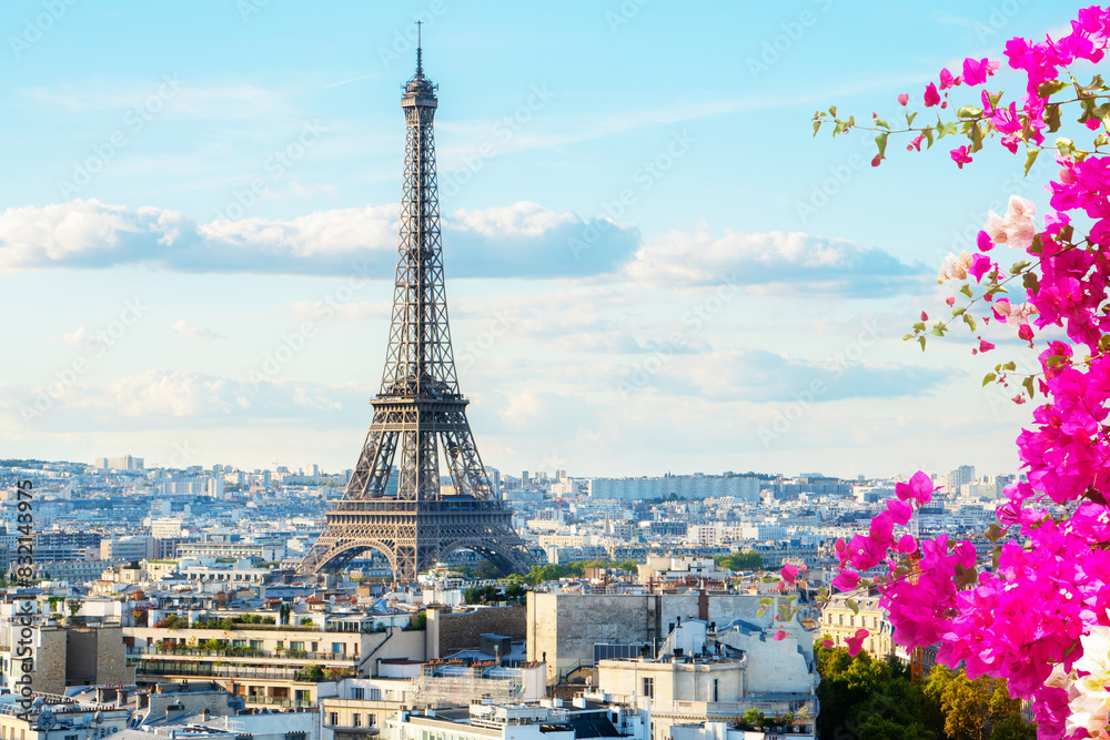 Fototapeta premium Eiffel Tower iconic landmark and Paris old roofs, Paris France