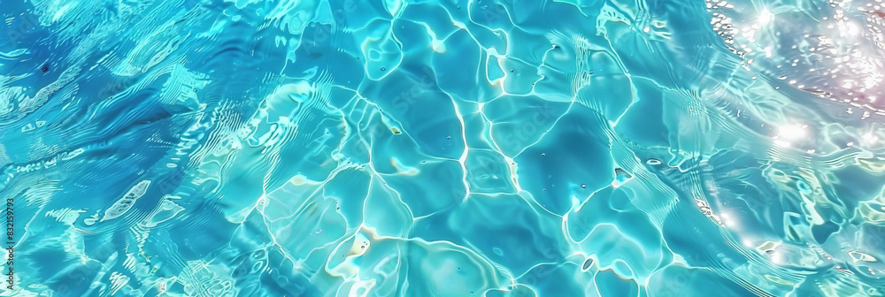 Clear blue water with sunlight reflections creating mesmerizing patterns and ripples in a refreshing and tranquil aquatic scene
Clear blue water with sunlight reflections creating mesmerizing patterns and ripples in a refreshing and tranquil aquatic scene