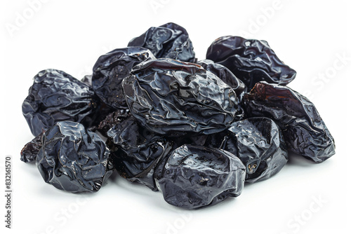 a pile of dried prunests on a white surface
