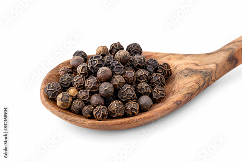 a wooden spoon filled with black pepper seeds