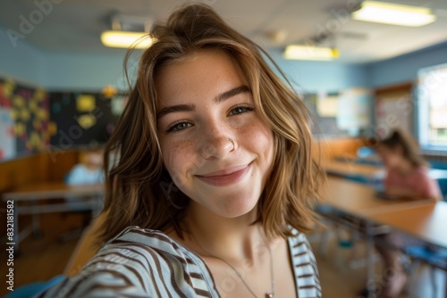 In the serene atmosphere of a classroom as an American caucasian student woman captures a self-portrait, her eyes reflecting pure happiness and ease.