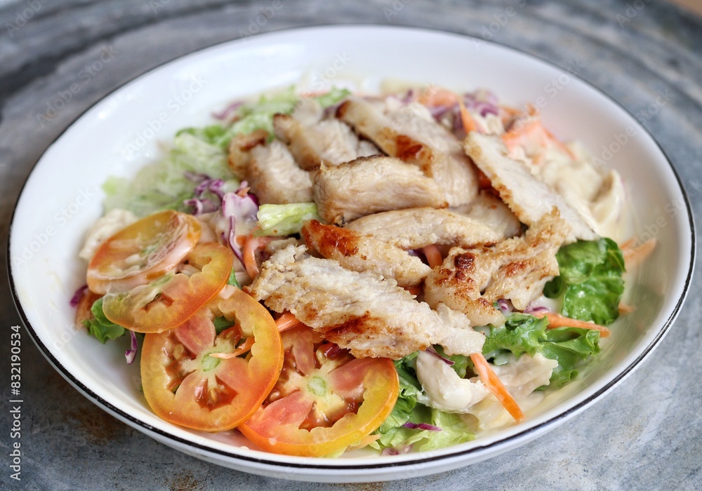 Fresh vegetable salad and pork steak Fresh vegetable salad and pork steak
