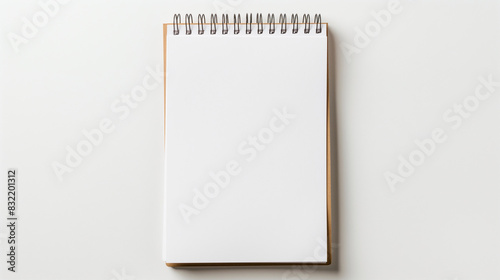 A neatly placed notepad on a white background, creating ample room for text around the edges