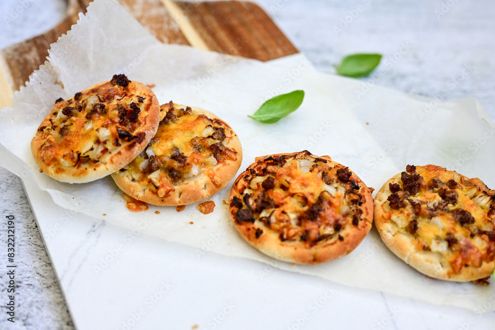 Mini american burger pizza with onion .American finger food Mini american burger pizza with onion .American finger food