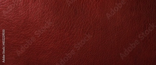 This image showcases a detailed close-up view of a red leather texture depicting quality and luxury