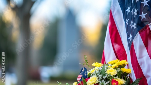 Patriotic Display of American Flags and Yellow Flowers at Memorial Park photo