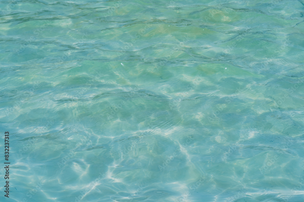 Photo background texture of blue transparent water in the Atlantic Ocean near the coast of Portugal. Photo background texture of blue transparent water in the Atlantic Ocean near the coast of Portugal.