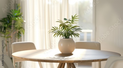 elegant round dining table with a beautiful potted plant at its center, surrounded by warm ivory and wood tones, evoking a cozy indoor atmosphere.