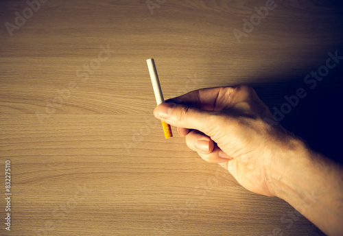 Cigarette in the Hand Closeup © Sabphoto