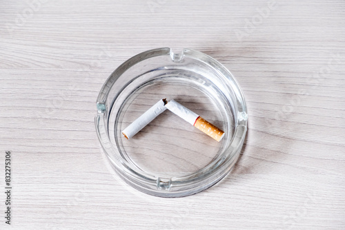 Broken Cigarette in Ashtray closeup © Sabphoto