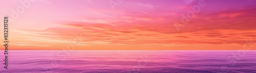 Vibrant and serene ocean view at sunset with beautiful pink and orange skies, reflecting calm waters. Perfect for nature, relaxation, and travel themes.