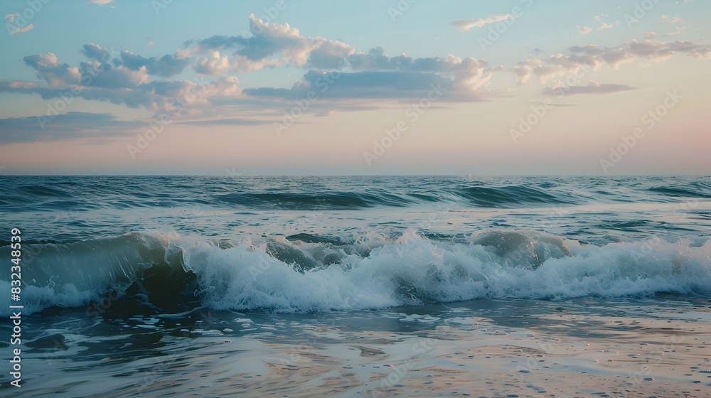 Fototapeta premium Gently Crashing Twilight Waves: A Soothing Ocean Symphony
