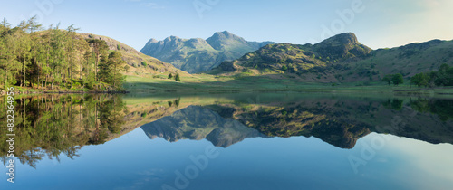 Canvas Print Mountain reflections in Blea Tarn at sunrise